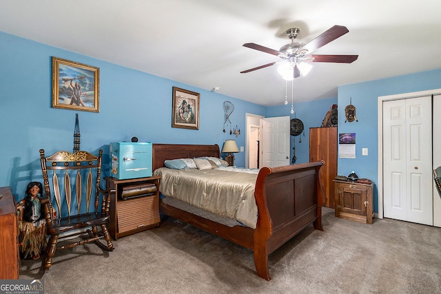 bedroom featuring a closet, carpet, and ceiling fan