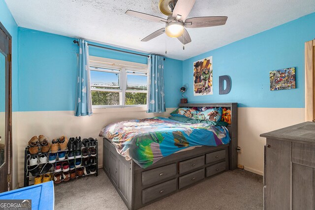 315 Watts Rd, Hiram, GA 30141 - bedroom featuring carpet floors, ceiling fan, baseboards, and a textured ceiling