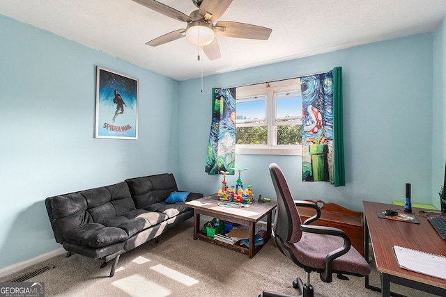 office area featuring carpet and ceiling fan