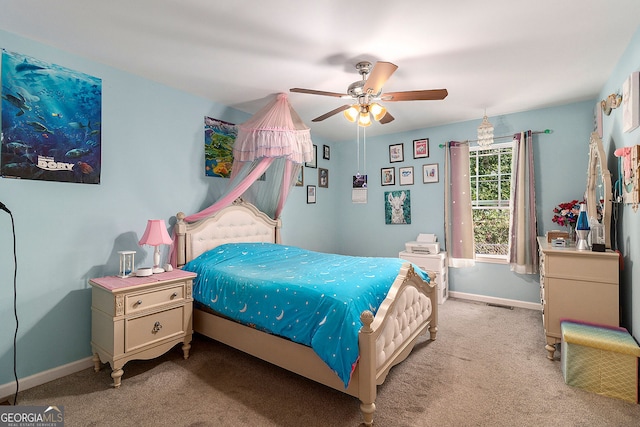 carpeted bedroom with ceiling fan