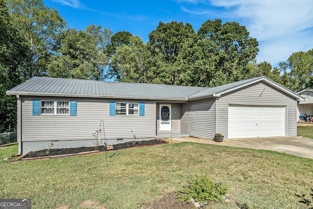 view of front of home with a garage and a front lawn