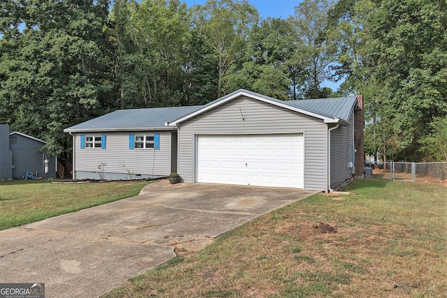 garage with a yard