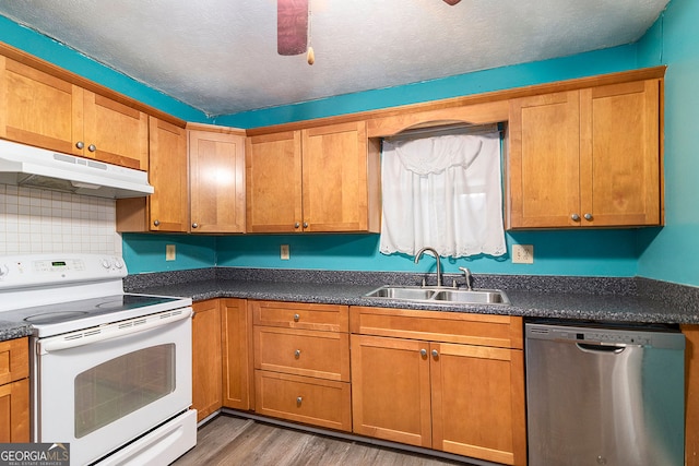 kitchen with sink, a textured ceiling, light hardwood / wood-style flooring, dishwasher, and electric stove