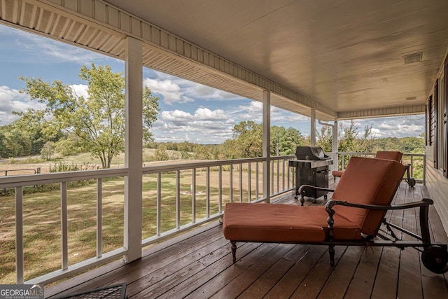 wooden deck with area for grilling