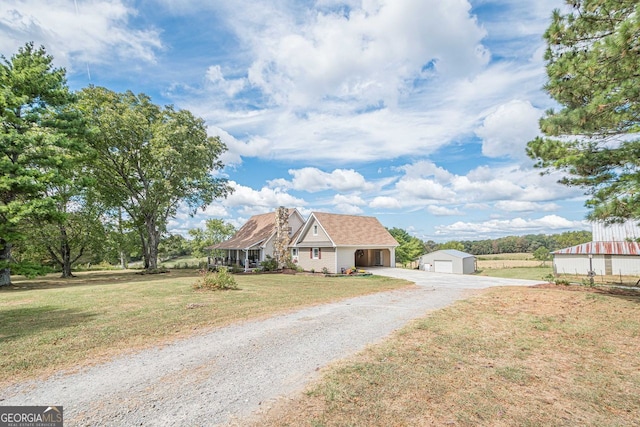 view of front of house with covered porch, a front yard, and central air condition unit