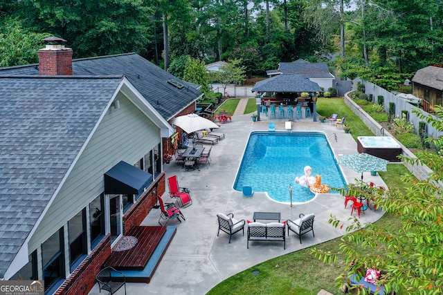 view of pool featuring an outdoor hangout area, a gazebo, and a patio area