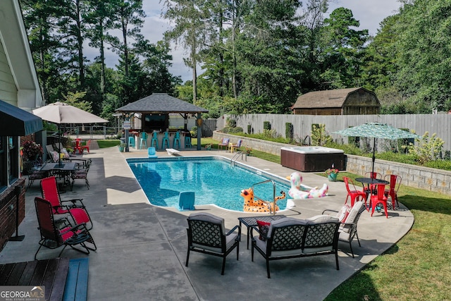 view of swimming pool with a patio