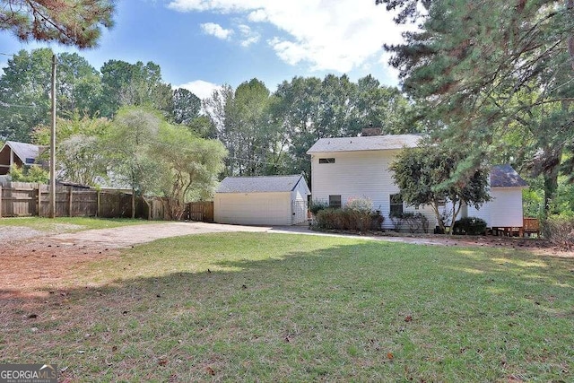 view of yard featuring a garage