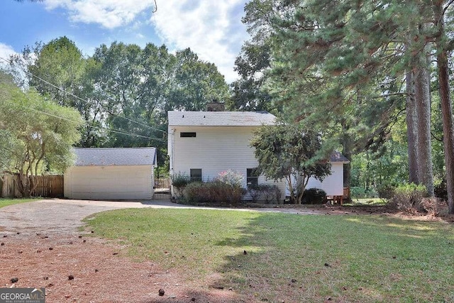 view of property exterior with a yard