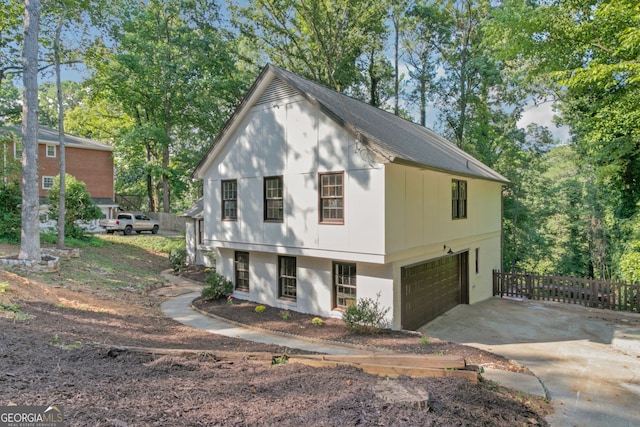 view of front of property with a garage