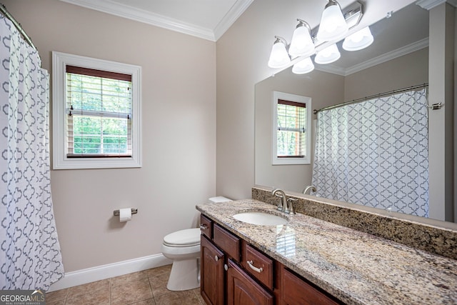 bathroom with vanity, plenty of natural light, toilet, and crown molding