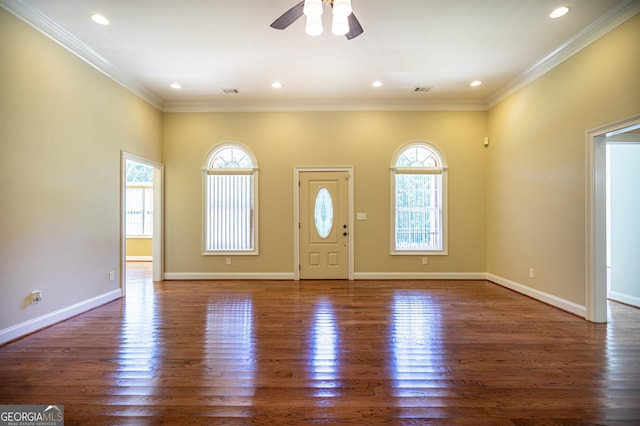 foyer featuring ornamental molding, ceiling fan, and dark hardwood / wood-style flooring