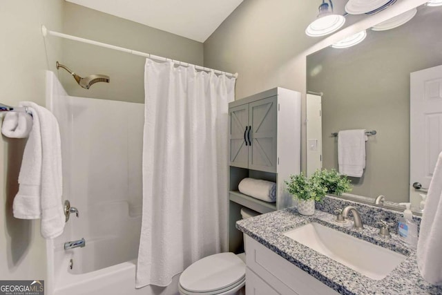 bathroom featuring toilet, shower / bath combination with curtain, and vanity