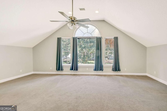 bonus room featuring lofted ceiling, carpet flooring, ceiling fan, and baseboards