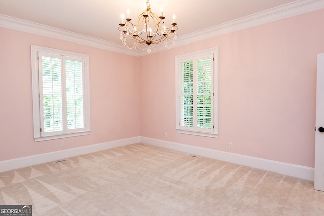 empty room featuring a notable chandelier, plenty of natural light, and crown molding