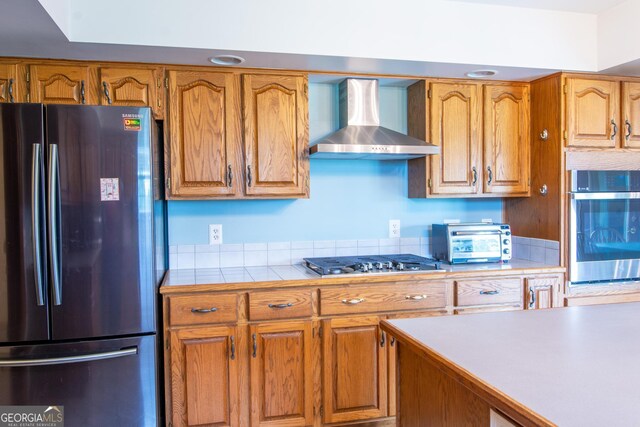 kitchen featuring dishwasher, tile countertops, a healthy amount of sunlight, and sink