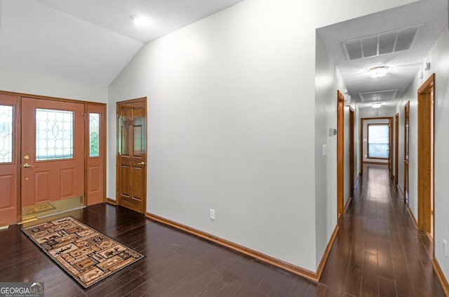 4909 Perry Rd, Claxton, GA 30417 - foyer entrance with dark wood-type flooring and vaulted ceiling