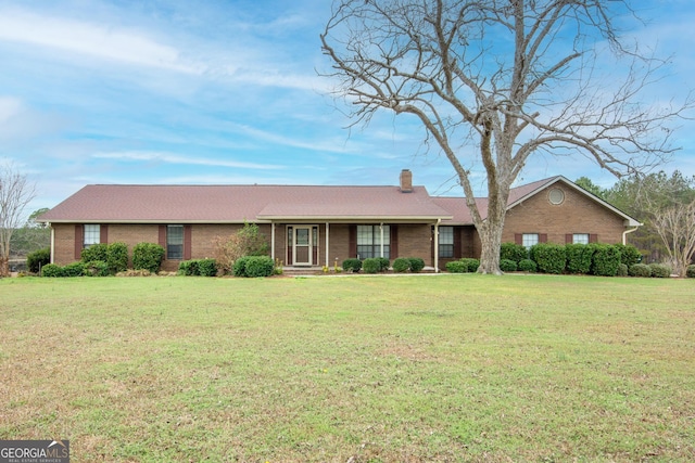 ranch-style home with a front yard