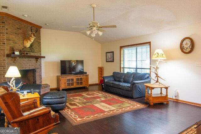 living room with lofted ceiling, ceiling fan, and dark wood-type flooring