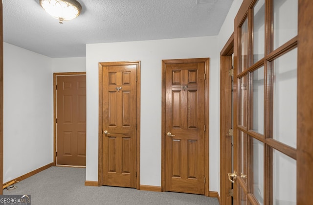 4909 Perry Rd, Claxton, GA 30417 - hall featuring carpet flooring and a textured ceiling