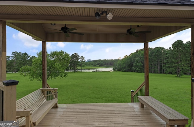 4909 Perry Rd, Claxton, GA 30417 - deck featuring ceiling fan and a lawn
