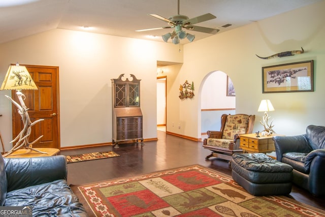 living room featuring lofted ceiling, hardwood / wood-style floors, and ceiling fan