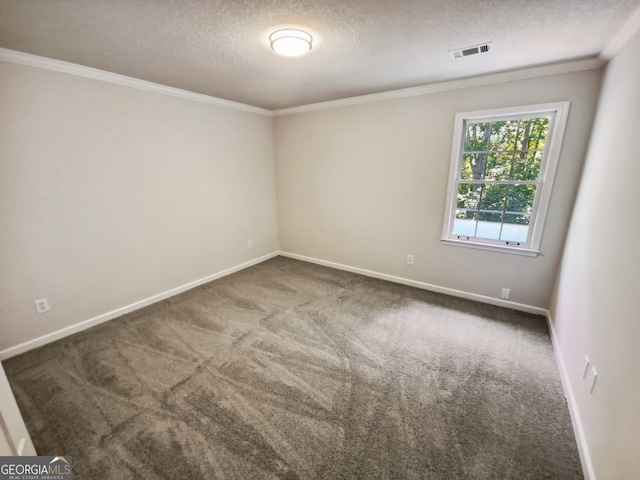 carpeted empty room featuring a textured ceiling and crown molding