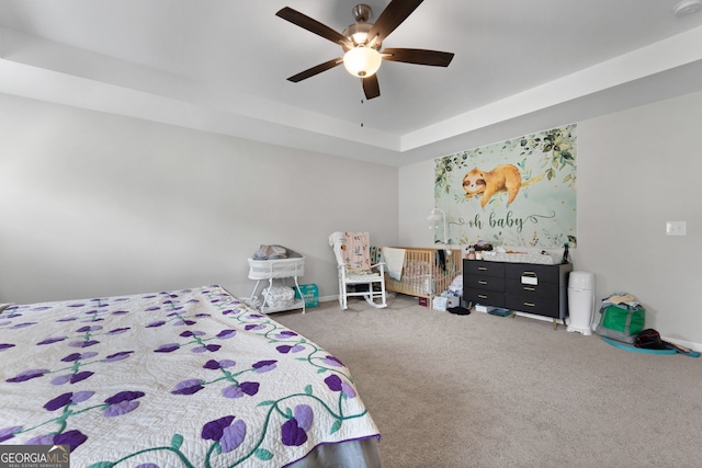 bedroom featuring ceiling fan and carpet flooring