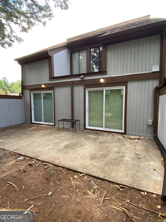 rear view of house with a patio