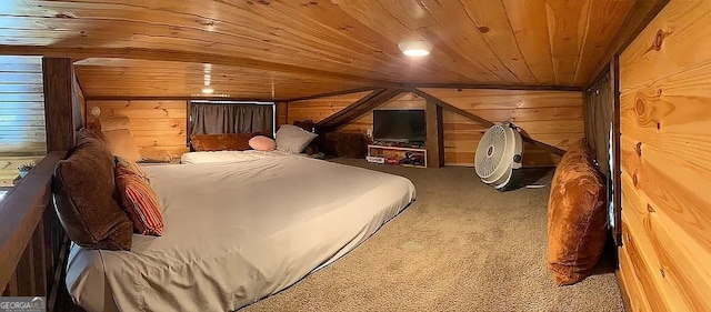 bedroom featuring carpet, wood ceiling, and wood walls