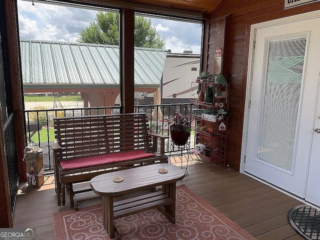 sunroom / solarium with plenty of natural light