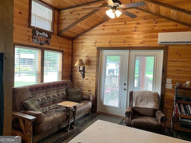 living room featuring wood ceiling, lofted ceiling, ceiling fan, and a healthy amount of sunlight