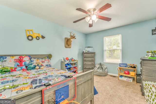 bedroom featuring ceiling fan and light colored carpet