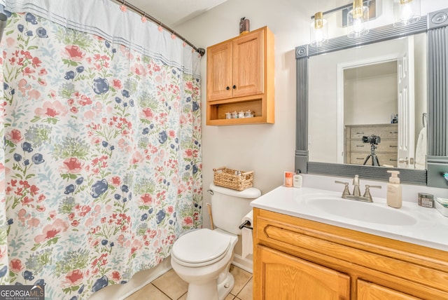 bathroom with vanity, tile patterned flooring, toilet, and a shower with shower curtain