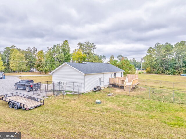 view of yard with a deck