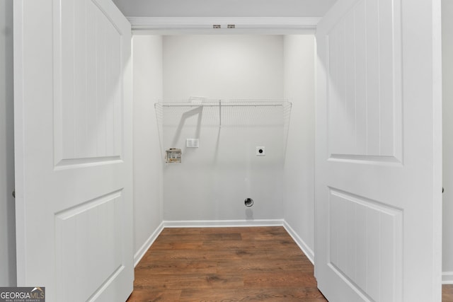 washroom featuring electric dryer hookup and dark hardwood / wood-style flooring