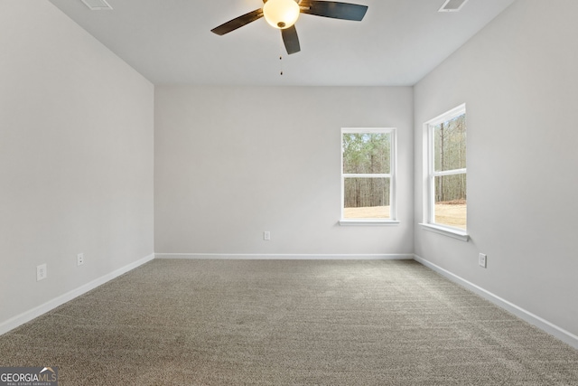 carpeted empty room with ceiling fan