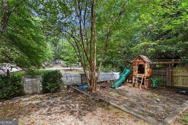 view of yard featuring a playground