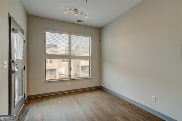 empty room featuring light hardwood / wood-style floors