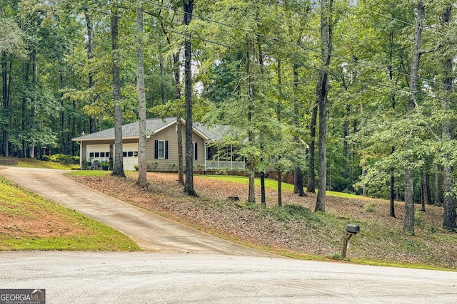 ranch-style house featuring a garage