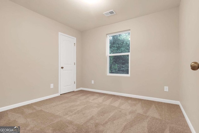 empty room featuring carpet