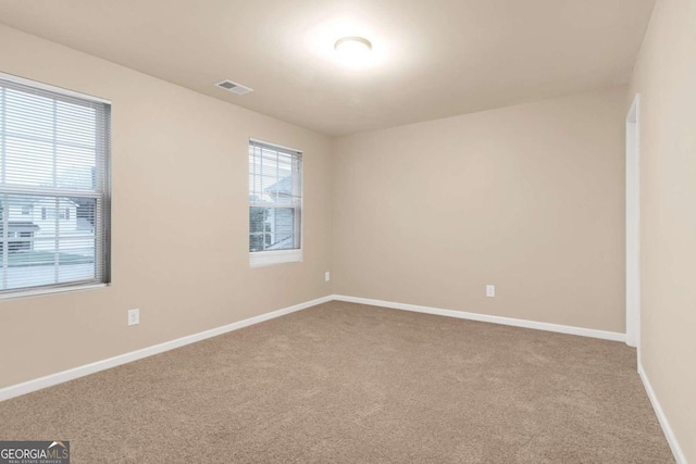 view of carpeted spare room