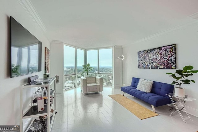 living room featuring crown molding, floor to ceiling windows, and wood-type flooring