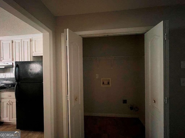 laundry area with washer hookup and hardwood / wood-style floors