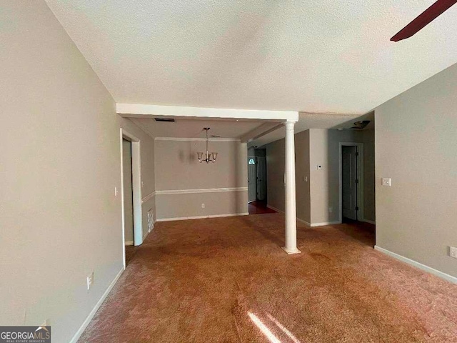 interior space with a textured ceiling