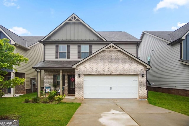 craftsman inspired home with a garage and a front yard