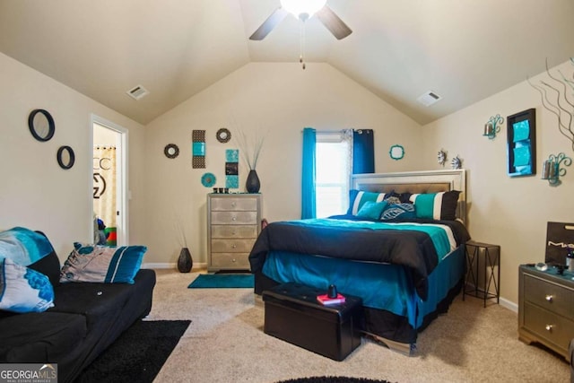 carpeted bedroom featuring vaulted ceiling and ceiling fan