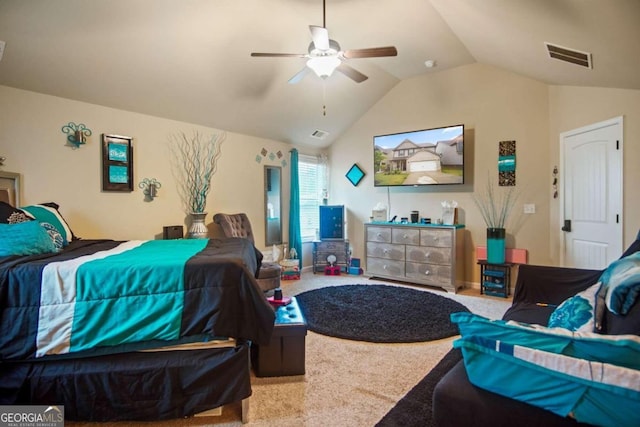 bedroom featuring ceiling fan, vaulted ceiling, and carpet