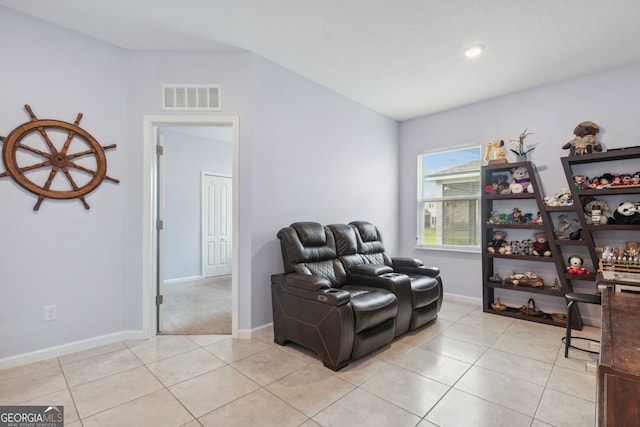 sitting room with light tile patterned flooring