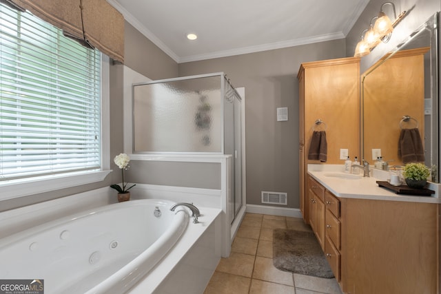 bathroom with ornamental molding, tile patterned flooring, independent shower and bath, and vanity